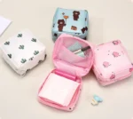 kf-S17702aecf7b34fd2883ef35229bd2177B-Cute-Large-Capacity-Sanitary-Napkin-Storage-Bags-Cartoon-Rabbit-Bear-Portable-Girls-Physiological-Period-Tampon-Organiser