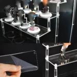 kf-Sa508379528e94c4ca5707d961ea4c0bfW-1-4-Tier-Acrylic-Display-Stand-Durable-Display-Rack-For-Cupcake-Perfume-Doll-Transparent-Trapezoidal-Blind