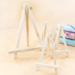 kf-S9f0bd3c4a6814d009390254424dc656fT-1-5pcs-Natural-Wood-Mini-Easel-Frame-Tripod-Display-Meeting-Wedding-Table-Name-Card-Stand-Display