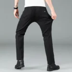 kf-Sf68ac2494326463493fa2d21aab0c907V-Men-s-pure-black-jeans-Korean-version-trendy-straight-fit-pants-men-s-comfortable-and-elastic