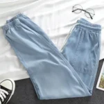 kf-Sae232408594244d893fc86e6dbef5bd9B-Summer-Thin-Ice-Silk-Jeans-Women-Elastic-High-Waist-Drawstring-Harem-Pants-Loose-All-matched-Beam
