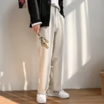 kf-Sd4cf1040f50e448eb1fd340690f0fc39j-men-s-drape-long-pants-Korean-version-trend-slim-fit-small-foot-casual-pants-men-s