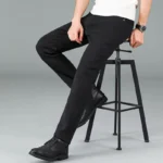 kf-Sf68ac2494326463493fa2d21aab0c907V-Men-s-pure-black-jeans-Korean-version-trendy-straight-fit-pants-men-s-comfortable-and-elastic