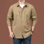 kf-Sa795cae911e04fcf9a10b7abde68f57bz-Multi-Pocket-Cargo-Work-Shirts-Men-Fashion-Solid-Color-Loose-Long-Sleeve-Tops-Climbing-Clothes-Camping