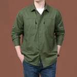 kf-Sa795cae911e04fcf9a10b7abde68f57bz-Multi-Pocket-Cargo-Work-Shirts-Men-Fashion-Solid-Color-Loose-Long-Sleeve-Tops-Climbing-Clothes-Camping