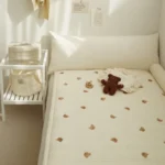 kf-Sb8491d9d6c8742e19a7924b26367c5b69-INS-Newborn-Children-Room-Decor-Baby-Crib-Thin-Cotton-Mattress-Bear-Embroidery-Quilted-Bed-Linen-Cushion